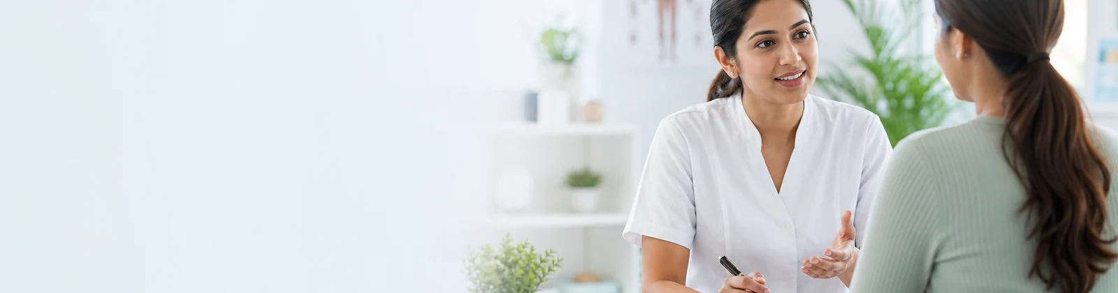 Supportive acupuncture consultation in a bright wellness clinic